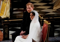 Príncipe Harry e Meghan Markle durante casamento na capela de São Jorge em Windsor (Foto: Owen Humphreys/pool via AP)