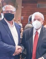 Lula e Alckmin participaram de um jantar na capital paulista – e fotos dos dois circularam pelas redes sociais antes mesmo do fim do evento (Foto: Reprodução/g1)