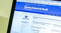 Para saber se teve a declaração liberada, o contribuinte deverá acessar a página da Receita Federal na Internet (Foto: Marcelo Camargo/Agência Brasil)